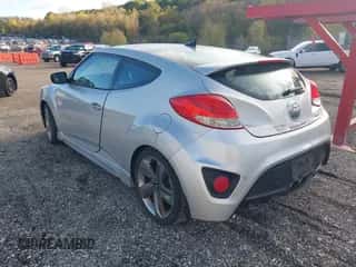 2014 Hyundai Veloster Turbo with VIN KMHTC6AE9EU189356, listed as a IAAI auction lot 43529684 with 96,297 mi miles and . Bid and sale history available at DreamBid. Image 3.