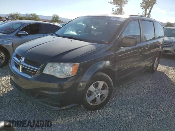 2012 Dodge Grand Caravan SXT z VIN 2C4RDGCG6CR197022, wystawiony jako Copart lot #90370815 z przebiegiem 131 612 mil mil oraz Czysty tytuł • Clean title. Historia ofert i sprzedaży dostępna na DreamBid. Obrazek 1.