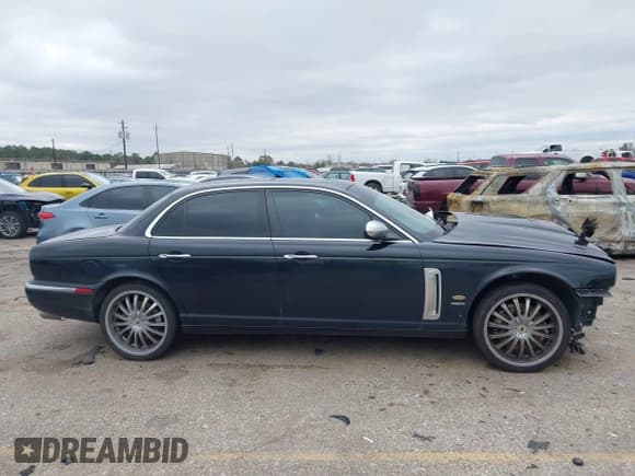 ✅ 2007 Jaguar XJ • VIN: SAJXA73C97TH14362 • Lot: 41305716. Listed on IAAI with 120,924 mi. Free auction sales archive from the USA and detailed vehicle history report at DreamBid. Image 13.