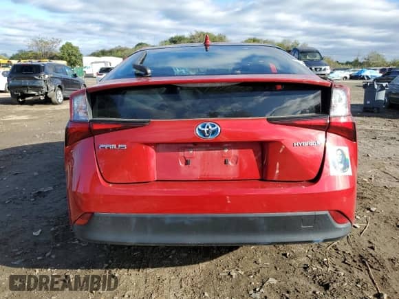 2022 Toyota Prius L Eco с VIN JTDKAMFU9N3164179, выставлен на аукционе Copart как лот 86318645 с пробегом 80 766 миль миль и Списание • Salvage title. История ставок и продаж доступна на DreamBid. Изображение 6.