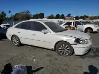 2008 Hyundai Azera Limited z VIN KMHFC46F28A311113, wystawiony jako Copart lot #77003534 z przebiegiem 114 902 mil mil oraz Szkoda całkowita • Salvage title. Historia ofert i sprzedaży dostępna na DreamBid. Obrazek 4.