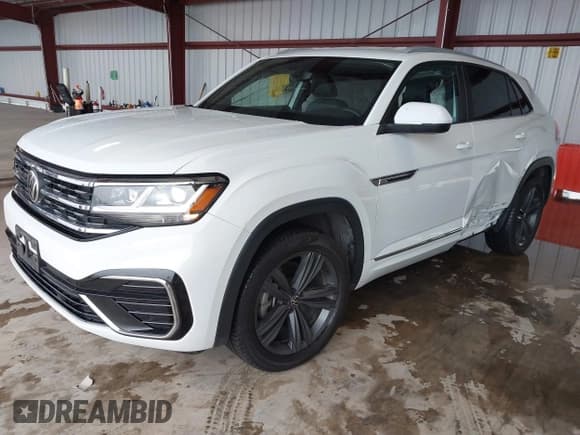✅ 2021 Volkswagen Atlas SE • VIN: 1V2NE2CA4MC201281 • Lot: 41242760. Listed on IAAI with 95,209 mi. Free auction sales archive from the USA and detailed vehicle history report at DreamBid. Image 2.