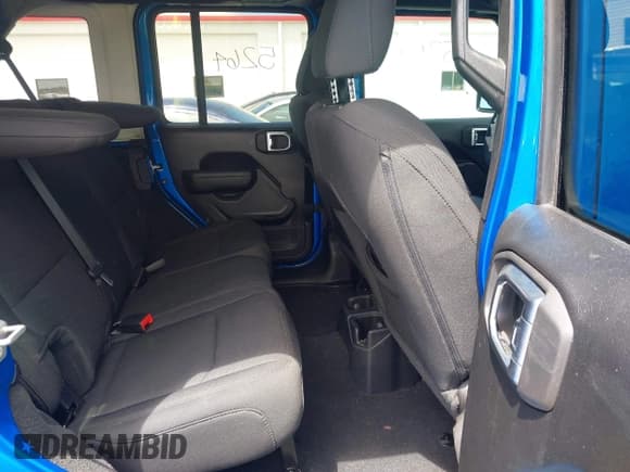 ✅ 2023 Jeep Wrangler Sport S • VIN: 1C4HJXDN4PW543700 • Lot: 42717039. Listed on IAAI with 21,061 mi. Free auction sales archive from the USA and detailed vehicle history report at DreamBid. Image 8.