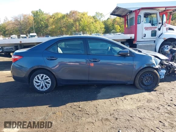 ✅ 2018 Toyota Corolla L • VIN: 2T1BURHE8JC114403 • Lot: 43407301. Listed on IAAI with 64,479 mi. Free auction sales archive from the USA and detailed vehicle history report at DreamBid. Image 13.
