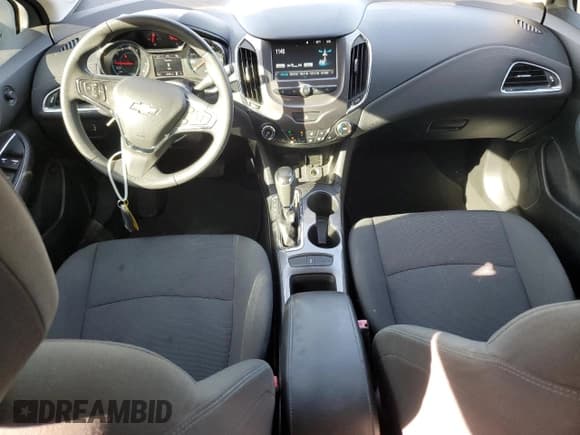 ✅ 2018 Chevrolet Cruze LT • VIN: 1G1BE5SM0J7164843 • Lot: 59765783. Listed on Copart with 65,834 mi. Free auction sales archive from the USA and detailed vehicle history report at DreamBid. Image 8.