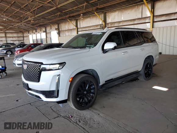 ✅ 2022 Cadillac Escalade Premium Luxury • VIN: 1GYS3BKL0NR296993 • Лот: 63444015. Опубликован ранее на Copart с пробегом 59 128 миль. Бесплатный доступ к архиву аукционных продаж из США и подробный отчёт об истории автомобиля на DreamBid. Изображение 1.