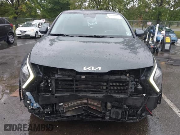 ✅ 2023 Kia Sportage LX • VIN: KNDPUCAGXP7041320 • Lot: 43228710. Listed on IAAI with 32,996 mi. Free auction sales archive from the USA and detailed vehicle history report at DreamBid. Image 6.