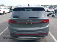 ✅ 2021 Hyundai Santa Fe SEL • VIN: 5NMS3DAJ9MH318767 • Lot: 43327611. Listed on IAAI with 82,332 mi. Free auction sales archive from the USA and detailed vehicle history report at DreamBid. Image 16.