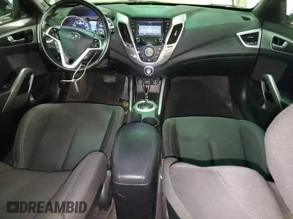 2017 Hyundai Veloster с VIN KMHTC6AD4HU323833, выставлен на аукционе Copart как лот 61636793 с пробегом 86 431 миль миль и . История ставок и продаж доступна на DreamBid. Изображение 8.