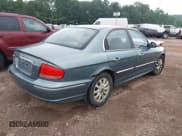 ✅ 2004 Hyundai Sonata GLS • VIN: KMHWF35H04A041801 • Lot: 42479712. Listed on IAAI with 153,666 mi. Free auction sales archive from the USA and detailed vehicle history report at DreamBid. Image 4.