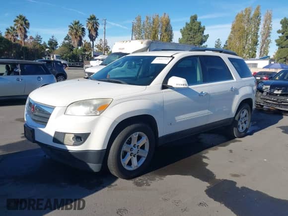 2008 Saturn Outlook XR z VIN 5GZER23798J200220, wystawiony jako IAAI lot #43607225 z przebiegiem 169 658 mil mil oraz . Historia ofert i sprzedaży dostępna na DreamBid. Obrazek 2.