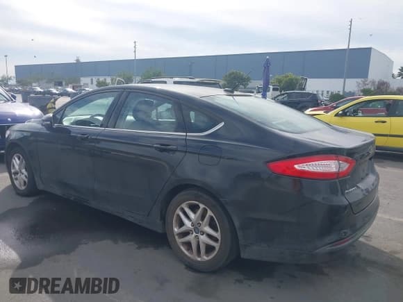 ✅ 2014 Ford Fusion SE • VIN: 3FA6P0HD0ER284272 • Lot: 43682112. Listed on IAAI with 165,428 mi. Free auction sales archive from the USA and detailed vehicle history report at DreamBid. Image 3.