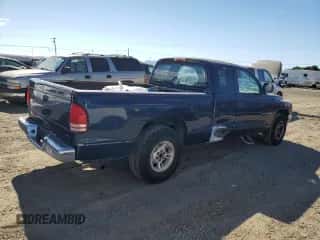 2000 Dodge Dakota z VIN 1B7GL22X4YS575147, wystawiony jako Copart lot #76636834 z przebiegiem 135 585 mil mil oraz Czysty tytuł • Clean title. Historia ofert i sprzedaży dostępna na DreamBid. Obrazek 3.