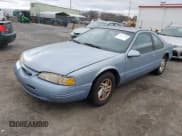 ✅ 1997 Ford Thunderbird LX • VIN: 1FALP62W2VH105702 • Лот: 41713980. Опубликован ранее на IAAI с пробегом 90 775 миль. Бесплатный доступ к архиву аукционных продаж из США и подробный отчёт об истории автомобиля на DreamBid. Изображение 2.