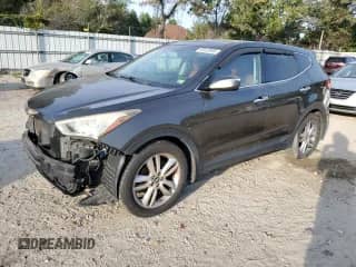 2013 Hyundai Santa Fe Sport z VIN 5XYZW3LA1DG064172, wystawiony jako Copart lot #83823895 z przebiegiem 165 970 mil mil oraz Szkoda całkowita • Salvage title. Historia ofert i sprzedaży dostępna na DreamBid. Obrazek 1.