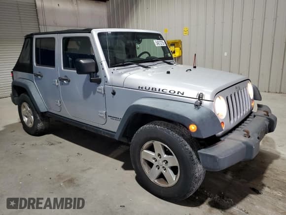 ✅ 2008 Jeep Wrangler Unlimited Rubicon • VIN: 1J4GA69128L590958 • Lot: 54013755. Listed on Copart with 146,997 mi. Free auction sales archive from the USA and detailed vehicle history report at DreamBid. Image 4.