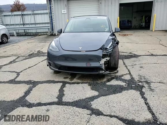 ✅ 2022 Tesla Model Y Long Range • VIN: 7SAYGAEE0NF520722 • Lot: 93269245. Listed on Copart with Not provided. Free auction sales archive from the USA and detailed vehicle history report at DreamBid. Image 14.