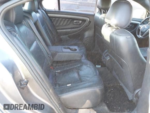 ✅ 2014 Ford Taurus SEL • VIN: 1FAHP2E81EG123593 • Lot: 43607478. Listed on IAAI with 200,101 mi. Free auction sales archive from the USA and detailed vehicle history report at DreamBid. Image 8.