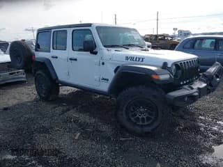 ✅ 2023 Jeep Wrangler Sport • VIN: 1C4HJXDG4PW567027 • Lot: 41633197. Wystawiony na IAAI z przebiegiem 14 782 mil. Bezpłatny archiwum sprzedaży aukcyjnych z USA i szczegółowy raport historii pojazdu na DreamBid. Zdjęcie 1.
