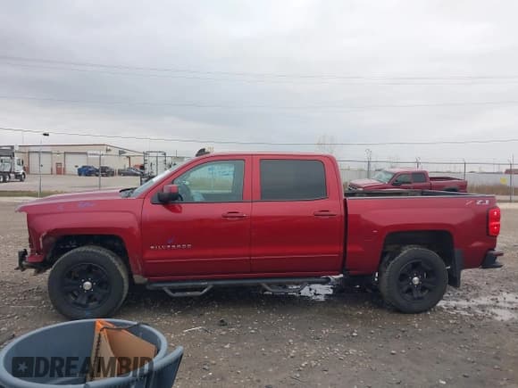 ✅ 2018 Chevrolet Silverado 1500 LT • VIN: 3GCUKREC6JG585828 • Lot: 43659037. Listed on IAAI with 130,703 mi. Free auction sales archive from the USA and detailed vehicle history report at DreamBid. Image 15.