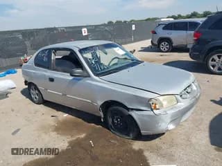 ✅ 2002 Hyundai Accent GS • VIN: KMHCG35C32U179011 • Lot: 43468979. Wystawiony na IAAI z przebiegiem 244 903 mil. Bezpłatny archiwum sprzedaży aukcyjnych z USA i szczegółowy raport historii pojazdu na DreamBid. Zdjęcie 1.