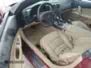 2006 Chevrolet Corvette с VIN 1G1YY26U565100990, выставлен на аукционе Copart как лот 76692824 с пробегом Не указан миль и Списание • Salvage title. История ставок и продаж доступна на DreamBid. Изображение 8.