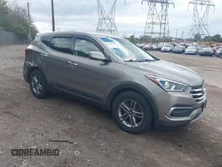 ✅ 2018 Hyundai Santa Fe 2.4L • VIN: 5NMZTDLBXJH092741 • Лот: 43514175. Опубликован ранее на IAAI с пробегом 107 947 миль. Бесплатный доступ к архиву аукционных продаж из США и подробный отчёт об истории автомобиля на DreamBid. Изображение 1.