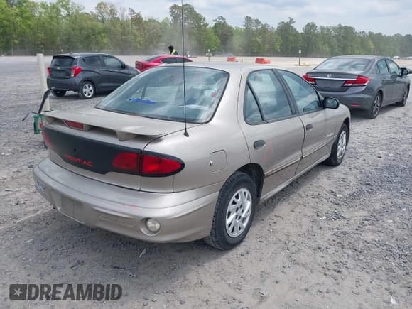 ✅ 2000 Pontiac Sunfire SE • VIN: 1G2JB5244Y7369494 • Lot: 42027842. Listed on IAAI with 104,985 mi. Free auction sales archive from the USA and detailed vehicle history report at DreamBid. Image 4.
