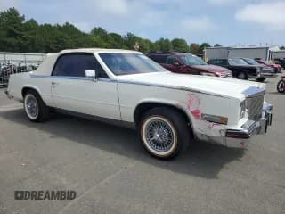 ✅ 1984 Cadillac Eldorado Biarritz • VIN: 1G6AL6787EE627169 • Лот: 64668625. Опубликован ранее на Copart с пробегом 34 245 миль. Бесплатный доступ к архиву аукционных продаж из США и подробный отчёт об истории автомобиля на DreamBid. Изображение 4.