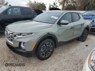 2023 Hyundai Santa Cruz SEL z VIN 5NTJB4AE3PH053516, wystawiony jako Copart lot #77860774 z przebiegiem 13 383 mil mil oraz Szkoda całkowita • Salvage title. Historia ofert i sprzedaży dostępna na DreamBid. Obrazek 1.