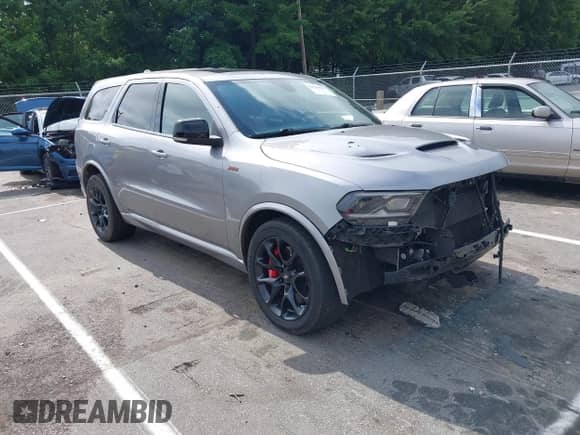 2021 Dodge Durango R/T with VIN 1C4SDJCT6MC879260, listed as a IAAI auction lot 42709837 with 59,646 mi miles and . Bid and sale history available at DreamBid. Image 1.