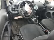 ✅ 2016 Smart fortwo Prime • VIN: WMEFJ5DA4GK054621 • Lot: 68703105. Wystawiony na Copart z przebiegiem 70 845 mil. Bezpłatny archiwum sprzedaży aukcyjnych z USA i szczegółowy raport historii pojazdu na DreamBid. Zdjęcie 8.