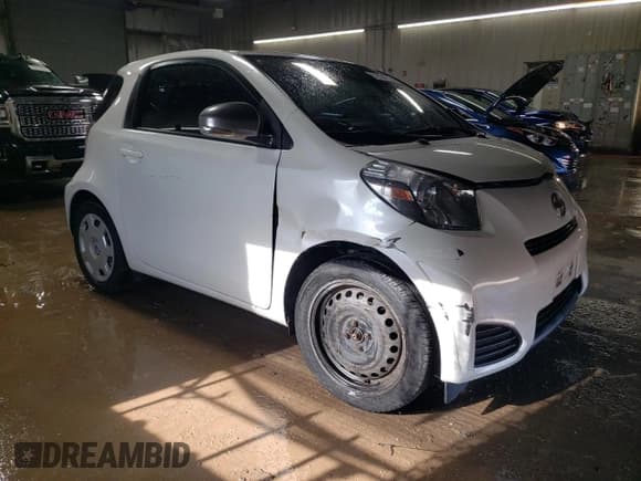 ✅ 2014 Scion iQ • VIN: JTNJJXB02EJ030301 • Lot: 51634175. Wystawiony na Copart z przebiegiem 158 157 mil. Bezpłatny archiwum sprzedaży aukcyjnych z USA i szczegółowy raport historii pojazdu na DreamBid. Zdjęcie 4.