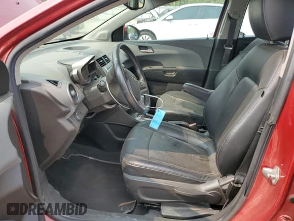 ✅ 2012 Chevrolet Sonic LTZ • VIN: 1G1JE6SH7C4111176 • Lot: 59002575. Listed on Copart with 116,640 mi. Free auction sales archive from the USA and detailed vehicle history report at DreamBid. Image 7.