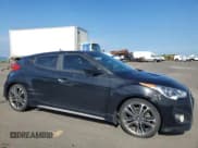 ✅ 2016 Hyundai Veloster Turbo • VIN: KMHTC6AE6GU263562 • Lot: 62899445. Wystawiony na Copart z przebiegiem 88 545 mil. Bezpłatny archiwum sprzedaży aukcyjnych z USA i szczegółowy raport historii pojazdu na DreamBid. Zdjęcie 4.