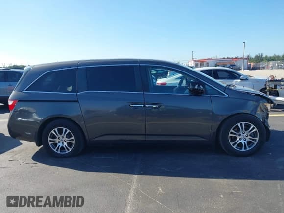 ✅ 2013 Honda Odyssey EX • VIN: 5FNRL5H46DB019386 • Lot: 43351857. Listed on IAAI with 147,538 mi. Free auction sales archive from the USA and detailed vehicle history report at DreamBid. Image 14.