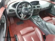 ✅ 2005 BMW 6 Series 645Ci • VIN: WBAEH73485B216175 • Лот: 63879105. Опубликован ранее на Copart с пробегом 167 092 миль. Бесплатный доступ к архиву аукционных продаж из США и подробный отчёт об истории автомобиля на DreamBid. Изображение 8.