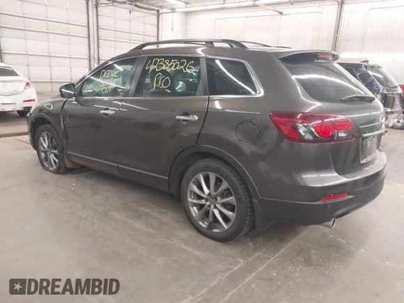 ✅ 2015 Mazda CX-9 Grand Touring • VIN: JM3TB3DA0F0464448 • Лот: 42385026. Опубликован ранее на IAAI с пробегом 118 203 миль. Бесплатный доступ к архиву аукционных продаж из США и подробный отчёт об истории автомобиля на DreamBid. Изображение 3.