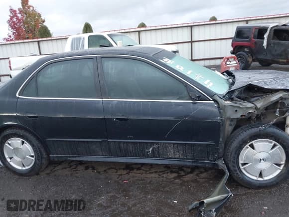 ✅ 2002 Honda Accord EX • VIN: 1HGCG16592A084089 • Lot: 43570704. Listed on IAAI with 172,032 mi. Free auction sales archive from the USA and detailed vehicle history report at DreamBid. Image 14.