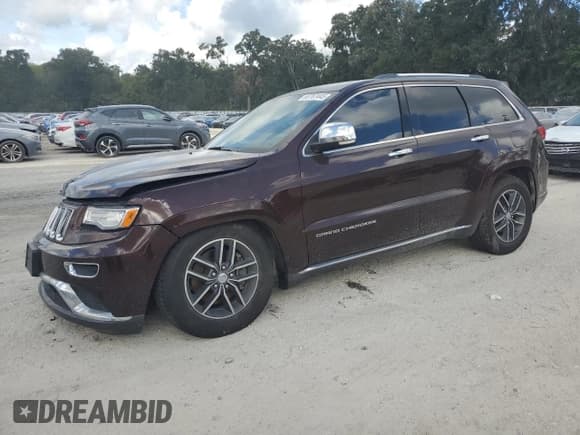✅ 2015 Jeep Grand Cherokee Summit • VIN: 1C4RJFJM3FC619305 • Lot: 83767445. Listed on Copart with 192,761 mi. Free auction sales archive from the USA and detailed vehicle history report at DreamBid. Image 1.