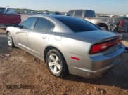 ✅ 2013 Dodge Charger SE • VIN: 2C3CDXBG6DH701961 • Lot: 43355152. Listed on IAAI with 113,746 mi. Free auction sales archive from the USA and detailed vehicle history report at DreamBid. Image 3.