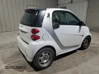 ✅ 2015 Smart fortwo Passion • VIN: WMEEJ3BA5FK814542 • Lot: 72978714. Wystawiony na Copart z przebiegiem 60 081 mil. Bezpłatny archiwum sprzedaży aukcyjnych z USA i szczegółowy raport historii pojazdu na DreamBid. Zdjęcie 3.