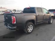 ✅ 2016 GMC Canyon 2WD SLE • VIN: 1GTG5CE30G1301490 • Lot: 41409489. Listed on IAAI with 109,618 mi. Free auction sales archive from the USA and detailed vehicle history report at DreamBid. Image 4.