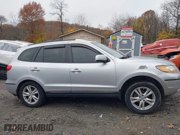 ✅ 2009 Hyundai Santa Fe SE • VIN: 5NMSH73E39H279698 • Lot: 43627061. Listed on IAAI with 185,779 mi. Free auction sales archive from the USA and detailed vehicle history report at DreamBid. Image 13.