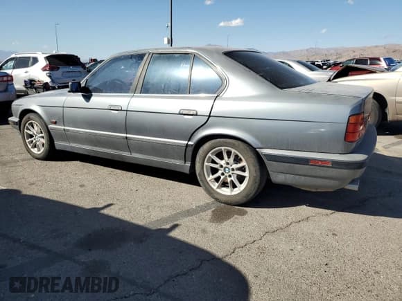 ✅ 1995 BMW 5 Series • VIN: WBAHE6322SGF34373 • Lot: 43861945. Listed on Copart with 193,491 mi. Free auction sales archive from the USA and detailed vehicle history report at DreamBid. Image 2.