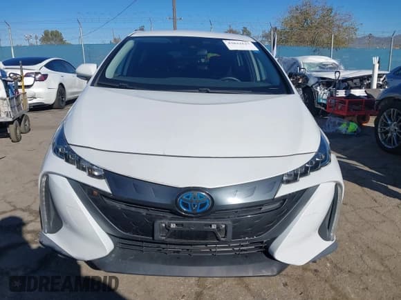 ✅ 2021 Toyota Prius XLE • VIN: JTDKAMFP5M3165273 • Lot: 43822615. Listed on IAAI with 70,012 mi. Free auction sales archive from the USA and detailed vehicle history report at DreamBid. Image 12.