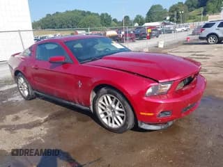 ✅ 2012 Ford Mustang Premium • VIN: 1ZVBP8AM6C5216220 • Lot: 42982184. Listed on IAAI with 131,864 mi. Free auction sales archive from the USA and detailed vehicle history report at DreamBid. Image 1.