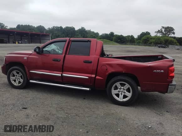 2010 Dodge Dakota Laramie z VIN 1D7CW5GP3AS156914, wystawiony jako IAAI lot #42569804 z przebiegiem 198 463 mil mil oraz . Historia ofert i sprzedaży dostępna na DreamBid. Obrazek 13.