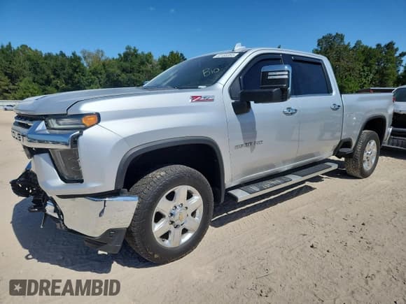 ✅ 2021 Chevrolet Silverado 2500HD LTZ • VIN: 1GC4YPEY3MF318151 • Лот: 82185355. Опубликован ранее на Copart с пробегом 173 234 миль. Бесплатный доступ к архиву аукционных продаж из США и подробный отчёт об истории автомобиля на DreamBid. Изображение 1.