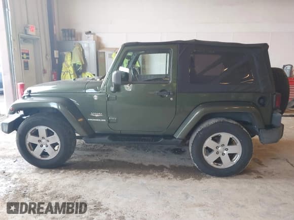 ✅ 2007 Jeep Wrangler Sahara • VIN: 1J4FA54187L125547 • Lot: 43487962. Listed on IAAI with 187,902 mi. Free auction sales archive from the USA and detailed vehicle history report at DreamBid. Image 14.